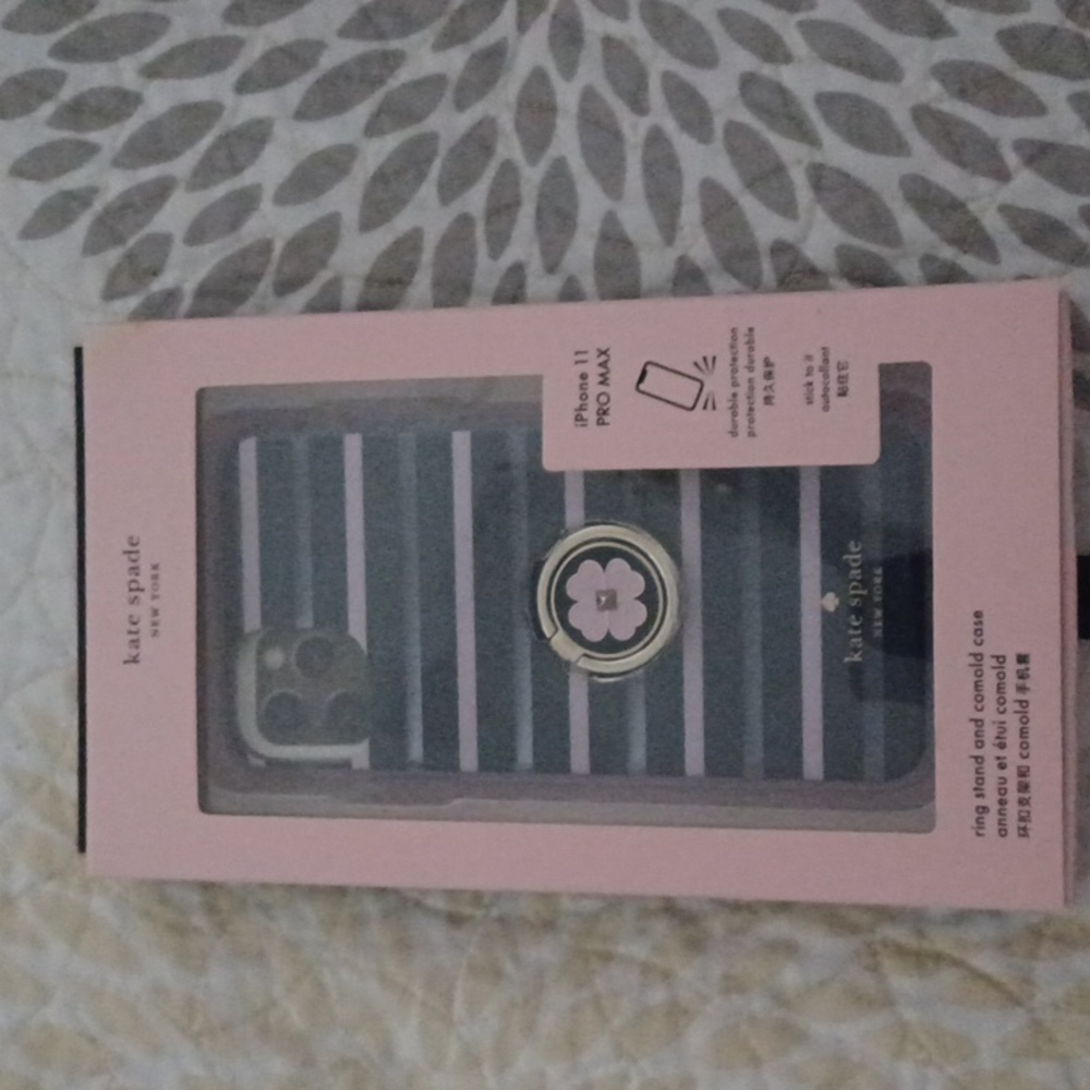 A Kate spade phone case with ring stand.
